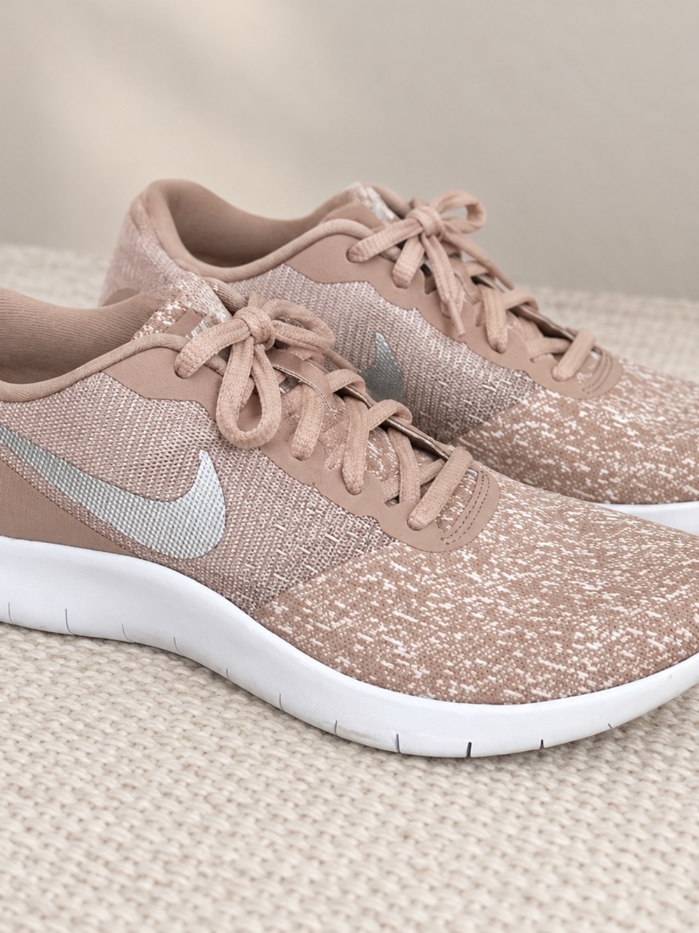 Nike Women's Light Pink Knit Running Sneakers with Silver Swoosh